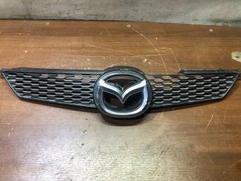 Решетка радиатора Mazda Demio 