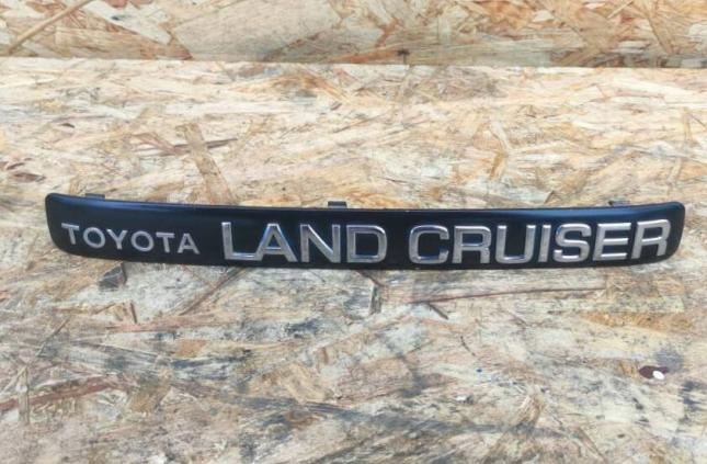 Эмблема Toyota Land Cruiser 100 подсветки номера 75132-60010