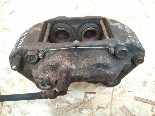 Суппорт Toyota Land Cruiser 100 передний правый 47730-60080