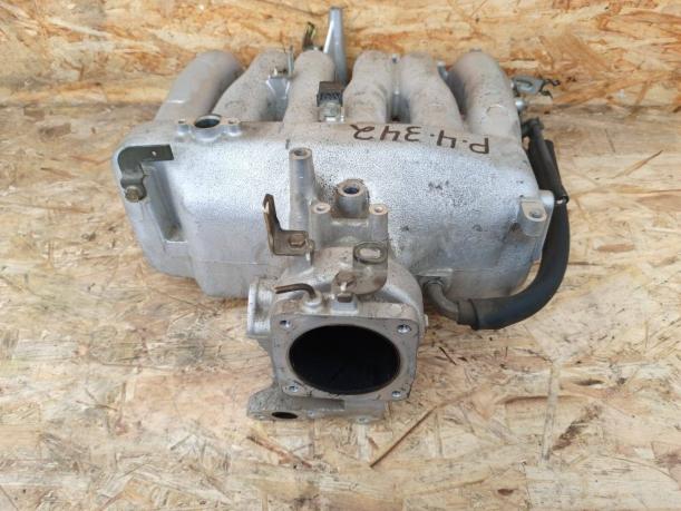 Коллектор впускной Mitsubishi Pajero 4 6G75 верх 1542A081