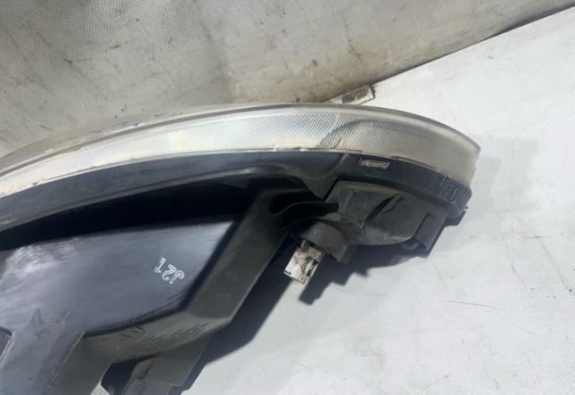 Фара галогеновая передняя левая Hyundai Getz 921011C505