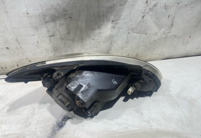 Фара галогеновая передняя левая Hyundai Getz 921011C505