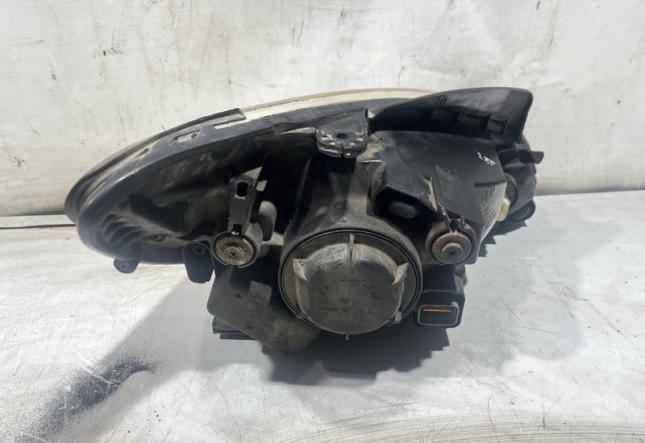 Фара галогеновая передняя левая Hyundai Getz 921011C505