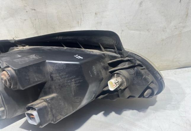 Фара галогеновая передняя левая Hyundai Getz 921011C505