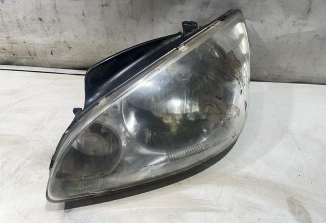Фара галогеновая передняя левая Hyundai Getz 921011C505