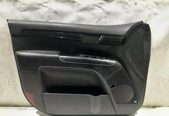 Обшивка боковой двери передняя левая Kia Mohave 823012J230WK