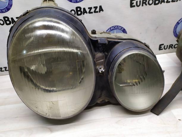 Фара передняя Mercedes W210 2108200361