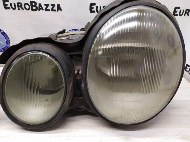 Фара передняя Mercedes W210 2108200361
