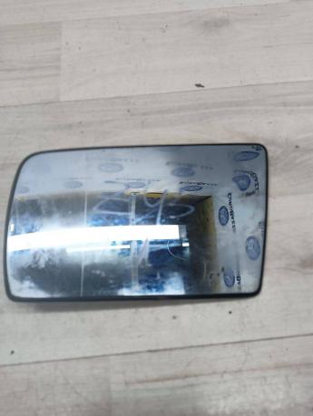 Зеркальный элемент левый Mercedes W210 2028100721