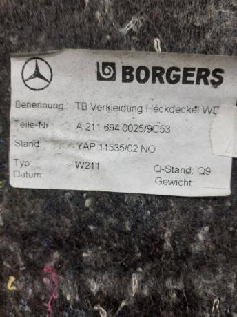 Обшивка багажника Mercedes W211 2116940025