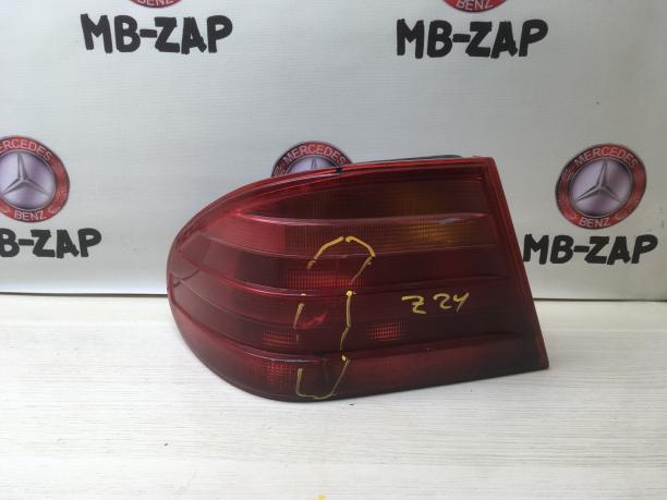 Фонарь задний левый Mercedes W210 2108203364