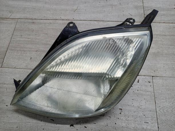 Фара левая Ford Fiesta 5 1320349