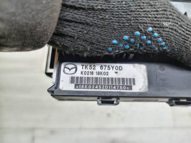 Блок комфорта Mazda TK52675Y0D