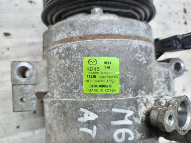Компрессор кондиционера Mazda 35000км KD4561450A