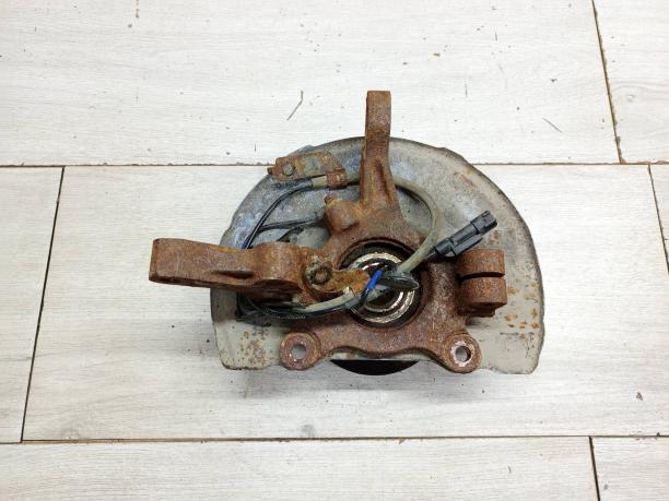 Кулак передний правый Mitsubishi Citroen Peugeot 3870A012