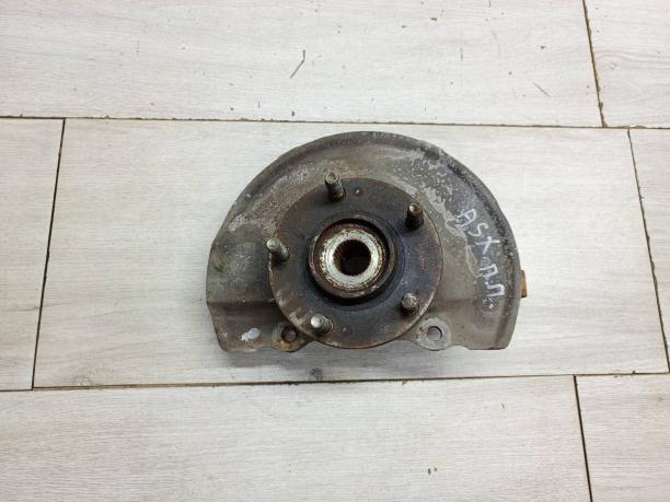 Кулак передний правый Mitsubishi Citroen Peugeot 3870A012
