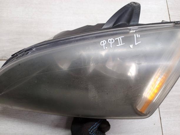 Фара левая Ford Focus 2 1481000
