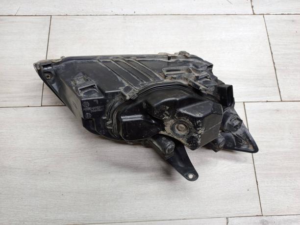 Фара левая Ford Focus 2 1481000