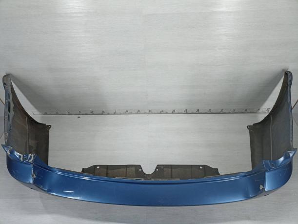 Бампер задний Subaru Legacy B13 57704AG060