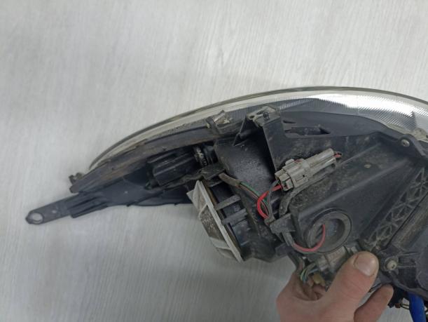 Фара правая Subaru Legacy B14 рестайлинг 84001AJ220