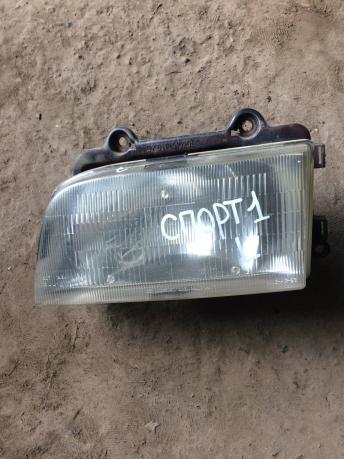 Фара левая Kia Sportage 1 0K01151020L