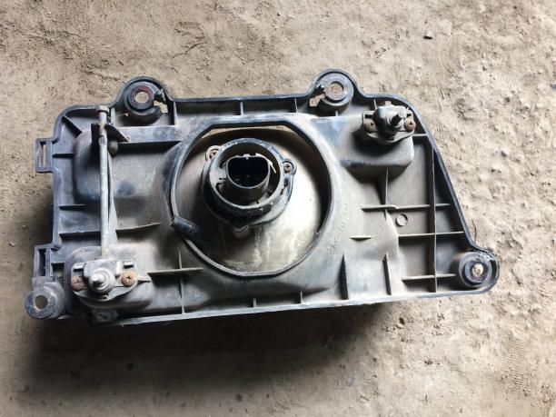 Фара левая Kia Sportage 1 0K01151020L