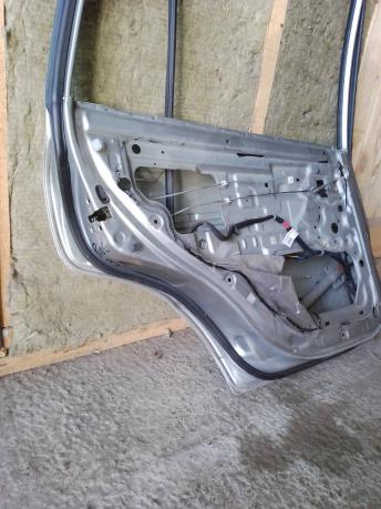 Дверь задняя левая Kia Rio 1 77003FD410