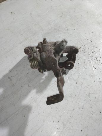 Суппорт задний правый Nissan Almera N16 440010N600
