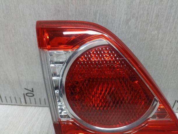 Фонарь задний левый внутренний Toyota Corolla E15 8159112150