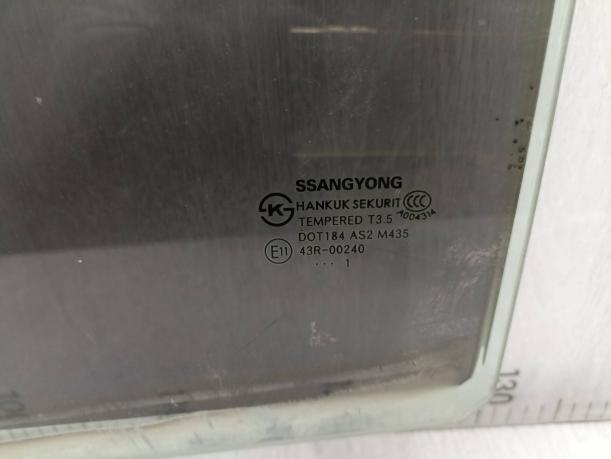 Стекло задней левой двери SsangYong Actyon 7337634011