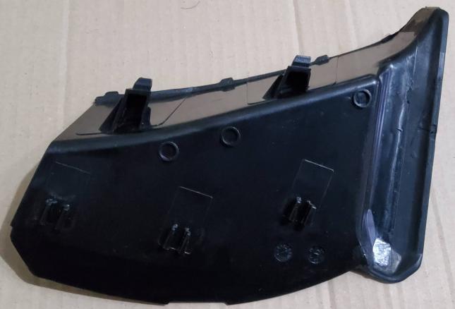 Накладка под фонарь Geely Coolray 7057015900