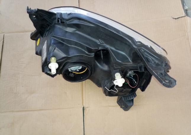 Фара Opel Tigra B правая оригинал 93164848