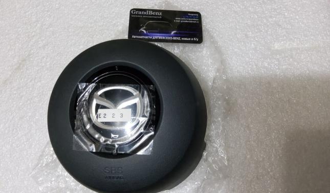 Подушка безопасности водителя mazda CX7 E223-57-K00A