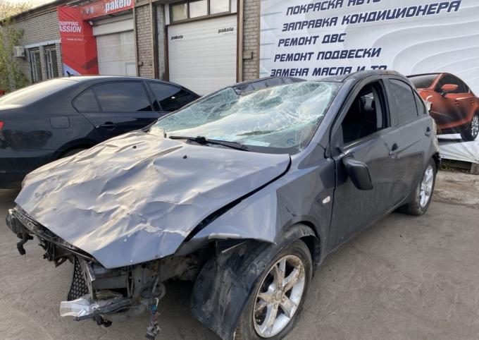 В разборе Mitsubishi Lancer 10 1,8 МКПП седан