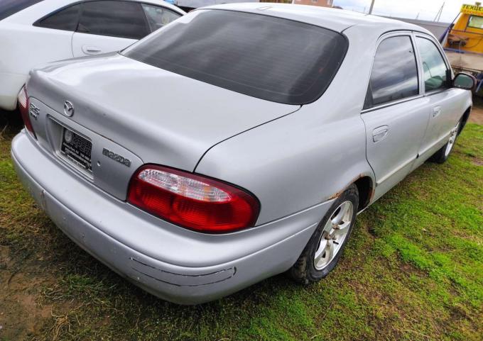 В разборе mazda 626 GF LX USA