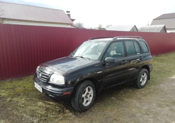 Suzuki Grand vitara 1 поколения. 2.0 AT