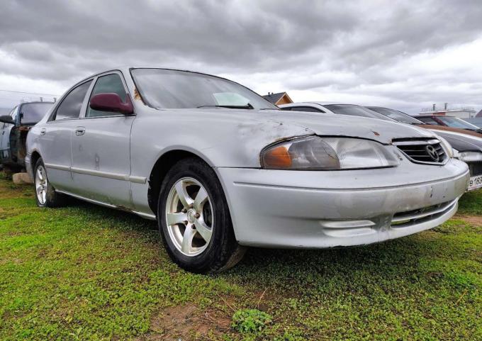 В разборе mazda 626 GF LX USA