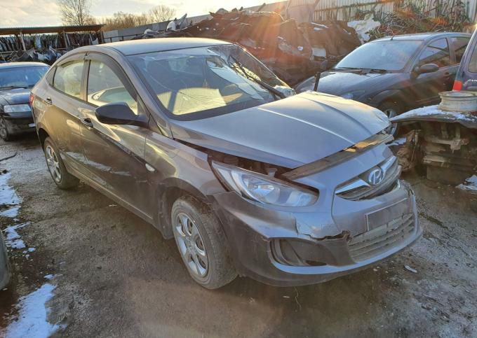 Hyundai Solaris 2013г 1.4 G4FA АКПП ut88 серый сед