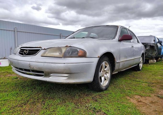 В разборе mazda 626 GF LX USA