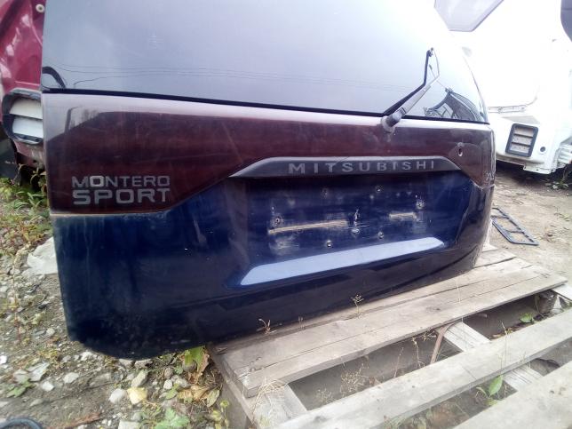 Дверь багажника Mitsubishi Montero Sport MR325733