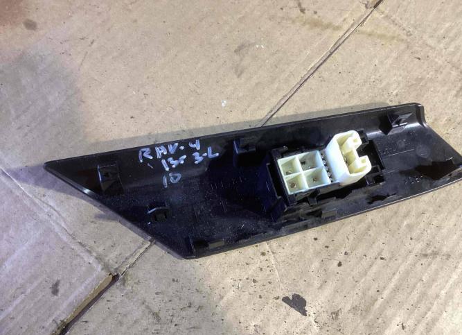 Кнопка стеклоподъемника двери задней левой Toyota 7427242030