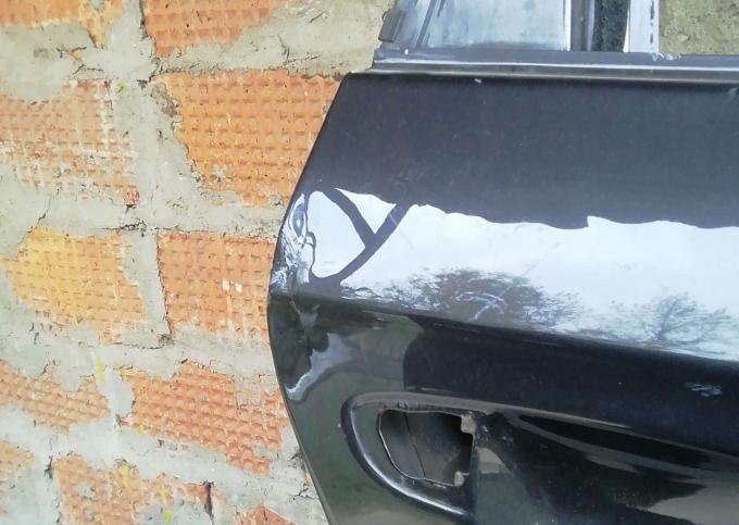 Дверь левая задняя VW Passat B6